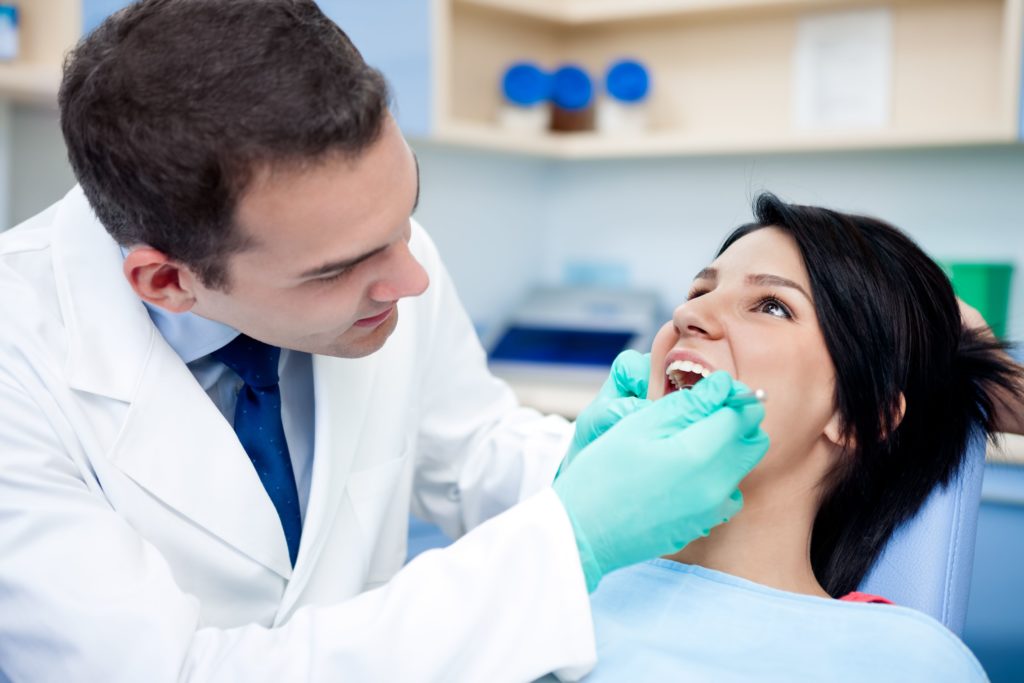 dentist with patient
